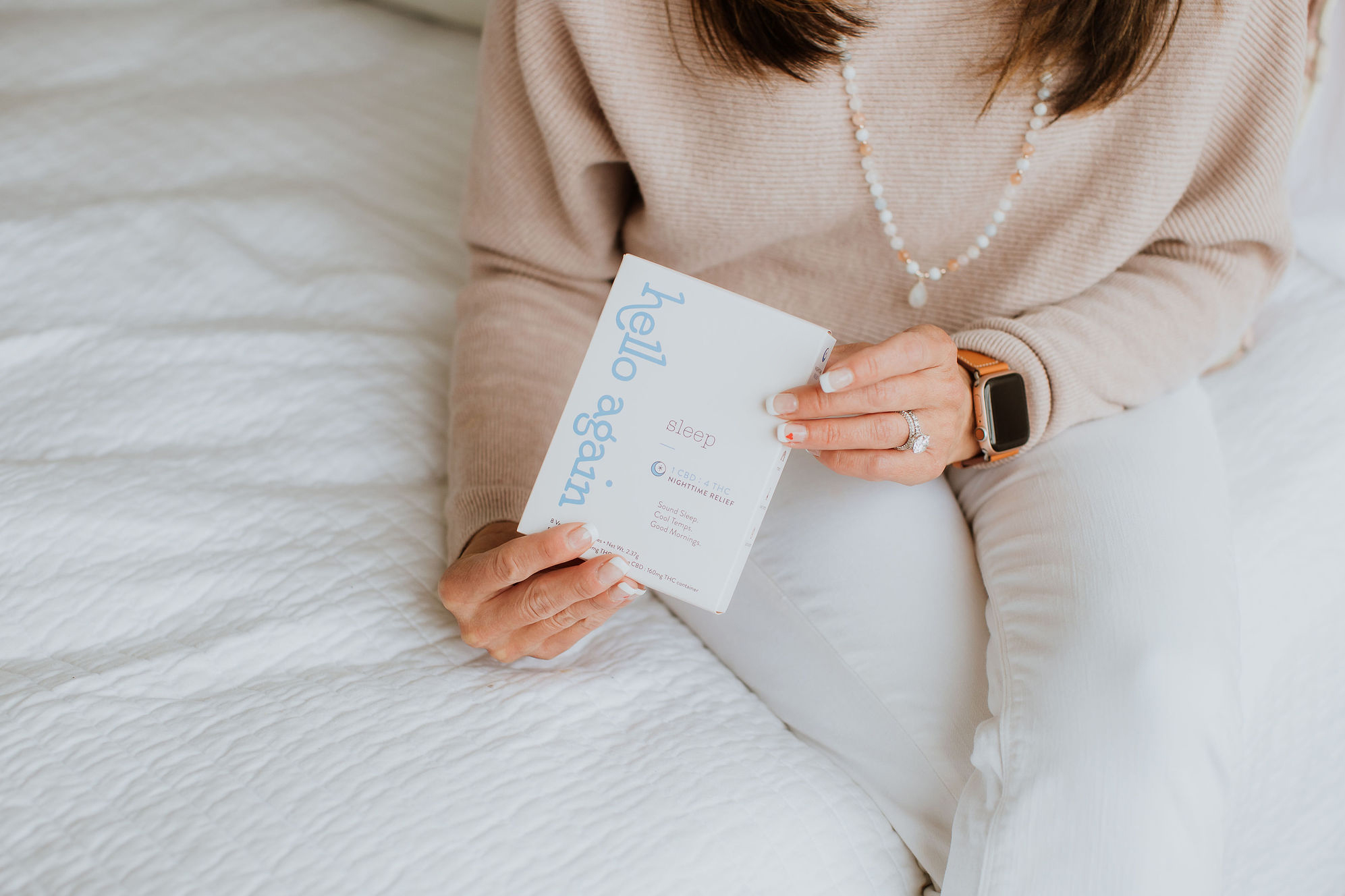 Person holding Hello Again Sleep