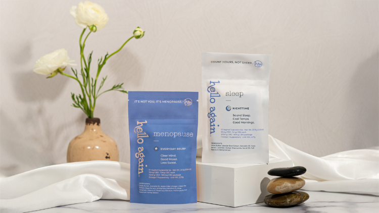 Hello Again Menopause and Sleep products rest on a bathroom counter.