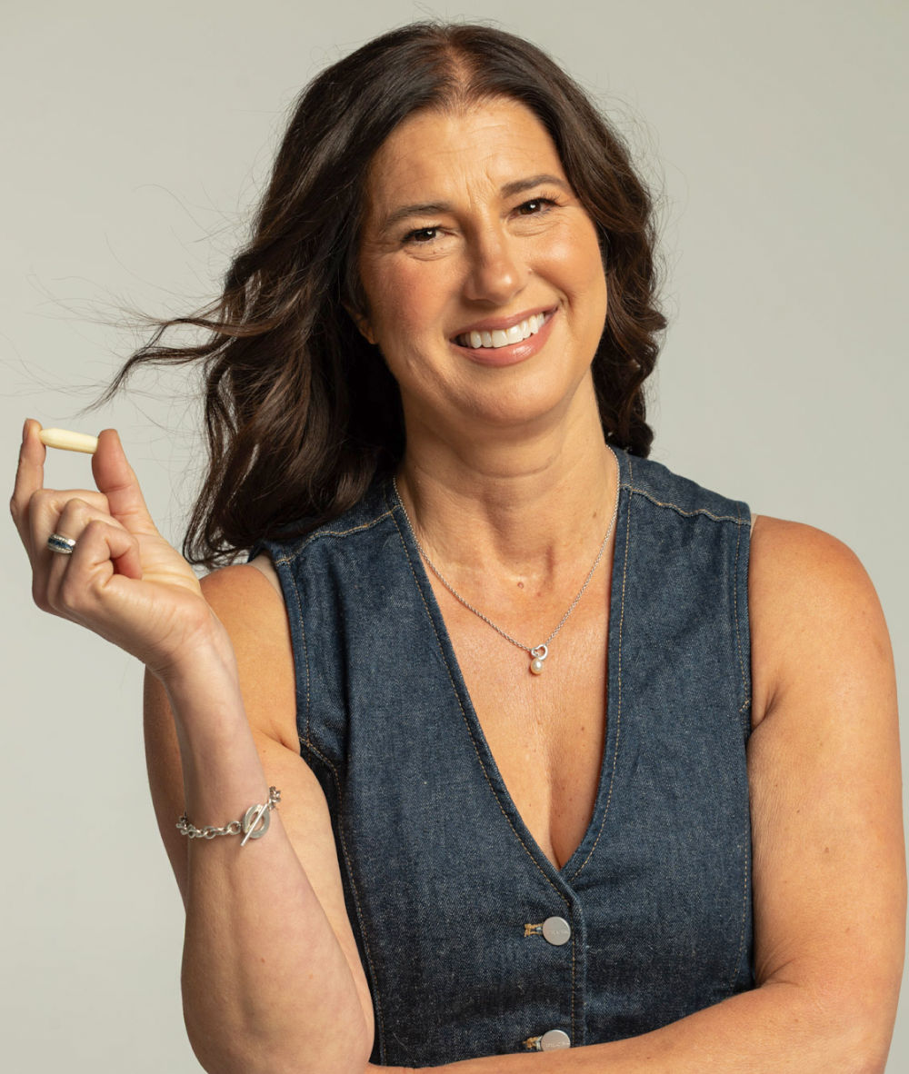 CEO Lisa Williams holding a Hello Again Suppository