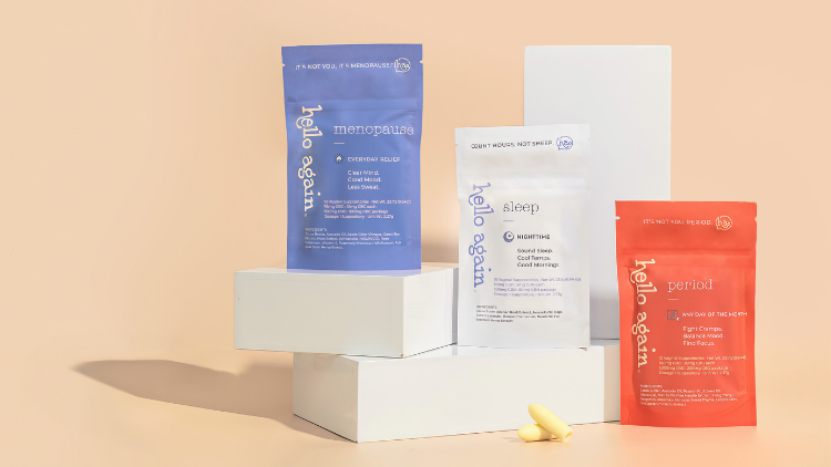 Hello Again Menopause, Sleep, and Period suppository packaging displayed on white blocks, supporting education on how to use a suppository for targeted relief.