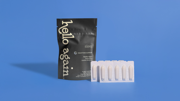 Hello Again Sleep CBD suppositories shown beside the charcoal Sleep formula pouch.