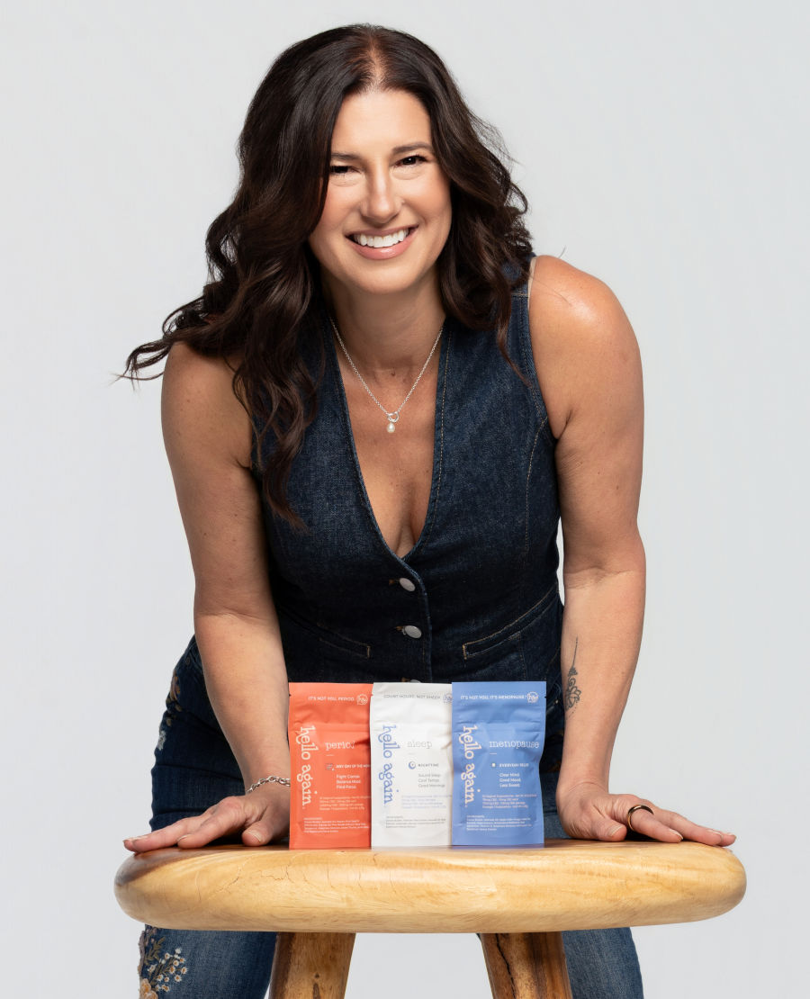 Lisa Williams, CEO, displaying all three Hello Again Products on a chair