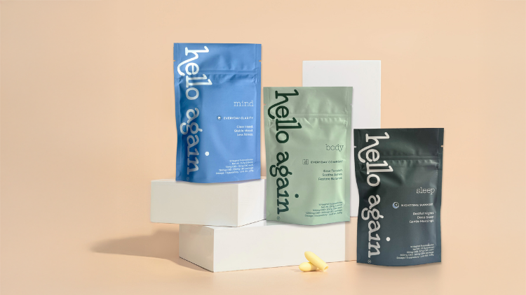 Hello Again Mind, Body, and Sleep vaginal suppository products displayed on white blocks against a peach background.