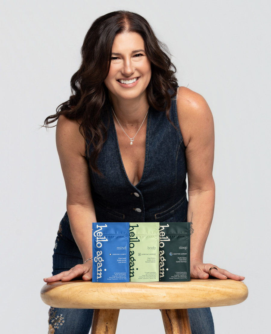 Lisa Williams, CEO, displaying all three Hello Again Products on a chair